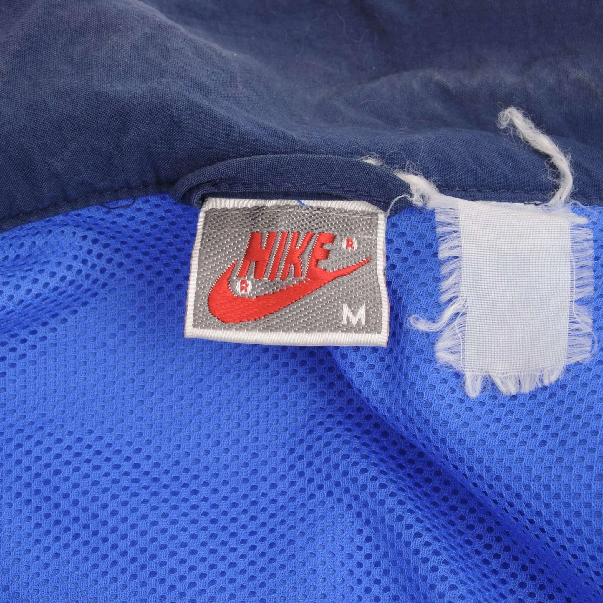 VINTAGE NIKE SWOOSH BLUE WINDBREAKER JACKET 1980S SIZE MEDIUM